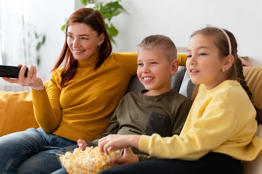 a mom with her two kids watching math movies