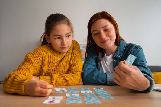 mom and daughter practicing multiplication and division at home
