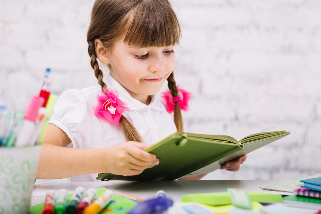 a kid reading a math book