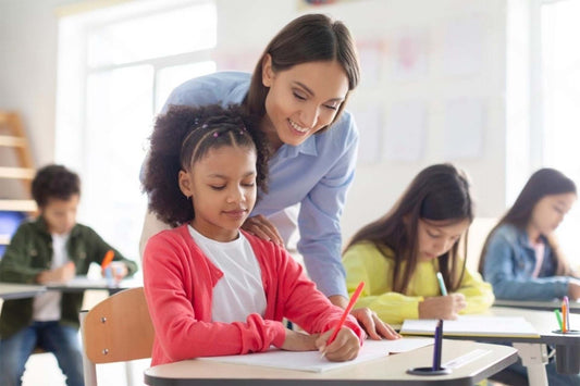a teacher helping a student get better at addition and subtraction